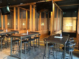 Interior view of Get Axed, an axe-throwing bar designed and built by Jeff Smith Construction in Roseville, CA.