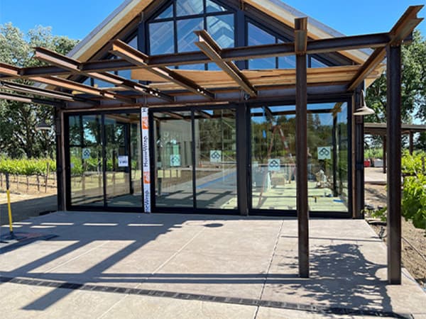 HOA community facility construction in El Dorado Hills. Exterior view of an HOA community building under construction near a pool area in El Dorado Hills, CA.